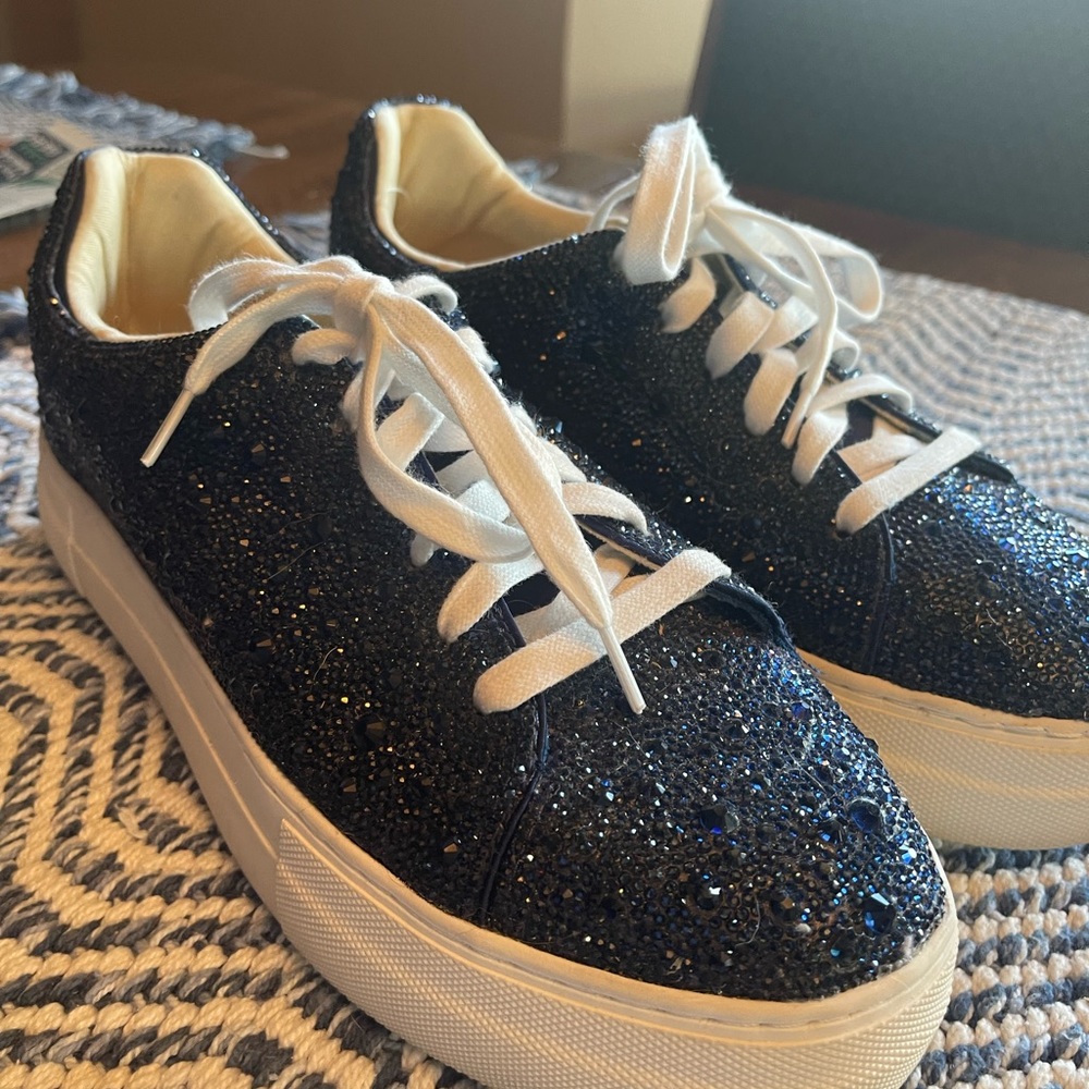 Beautiful and barely worn blue rhinestone Betsy Johnson tennis shoes.